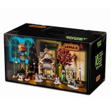 Lemax Spooky Town Creatures of the Night Pet Shop Set with illuminated buildings, featuring spooky pet shop displays and detailed figures.