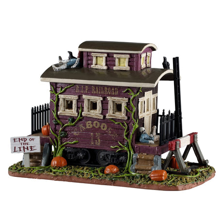 Creepy Ca-Boo-Se Lemax Spooky Town table accent featuring spooky haunted house with ghostly figures and eerie lighting.