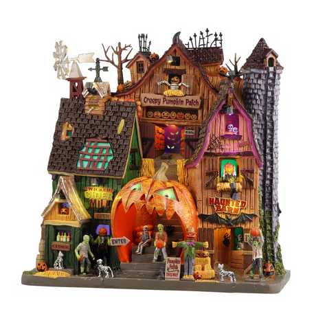 Lemax Creepy Pumpkin Patch illuminated building from Spooky Town display featuring spooky pumpkins and eerie details.