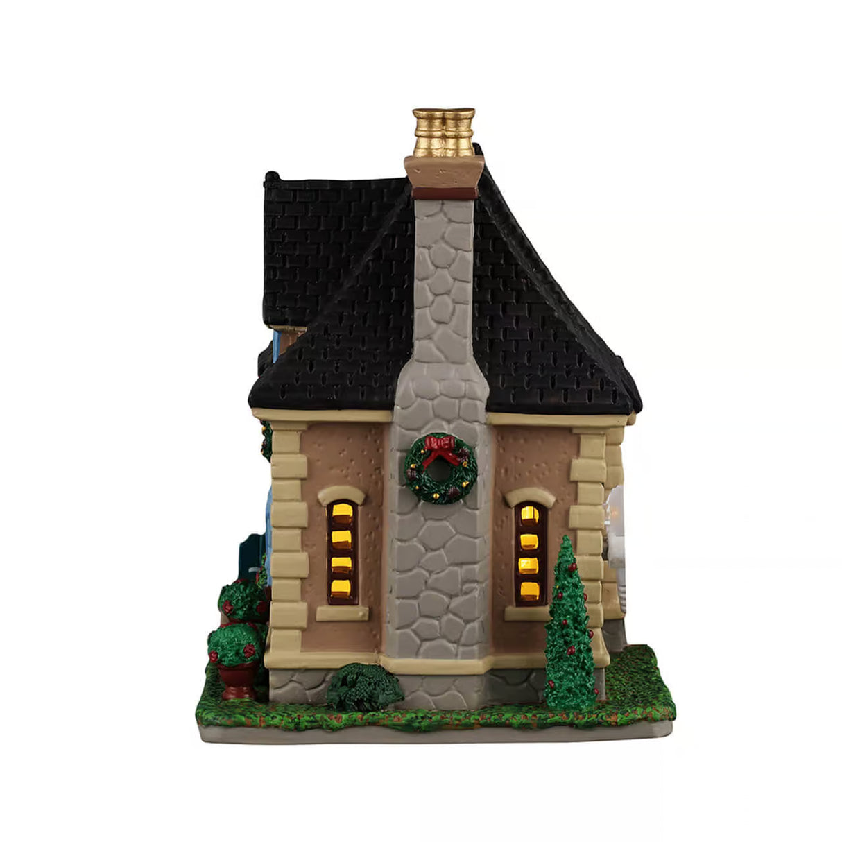 Lemax Dubois Residence illuminated building from Christmas village display, featuring festive holiday decor and detailed architecture.
