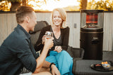 Enders POLO® Black 2.0 patio heater showing a compact black metal outdoor heater with a reflector for outdoor heating.