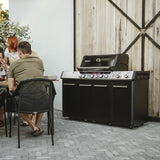 Enders UNIQ PRO 3 IK Turbo Gas BBQ with cover, stainless steel grill, side shelves, and control knobs for outdoor cooking.