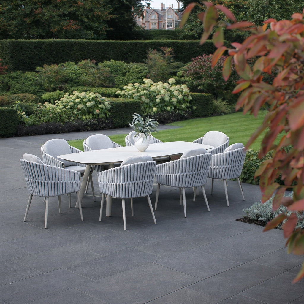 4 Seasons Outdoor Eva 6-seat metal dining set with Manolo 180cm ceramic barrel dining table, outdoor furniture for patio dining