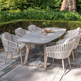 4 Seasons Outdoor Eva 6-seat dining set with Manolo 180cm barrel ceramic table and metal chairs in latte finish.
