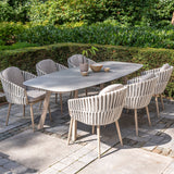 4 Seasons Outdoor Eva 6-seat metal dining set with Manolo 180cm barrel ceramic table, Latte-colored dining chairs and table.