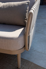 4 Seasons Outdoor Eva lounge set with two Monroe coffee tables and a support table, featuring metal frames and cushioned seating.