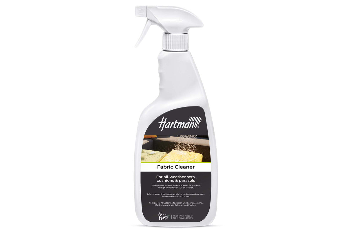 Hartman fabric cleaner spray for outdoor furniture cushions, showing a 750ml bottle of fabric cleaning spray on a cushion.
