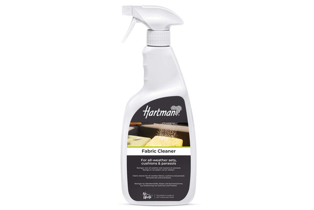 Hartman fabric cleaner spray for outdoor furniture cushions, showing a 750ml bottle of fabric cleaning spray on a cushion.