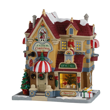 Lemax Father Christmas Gift Shop illuminated building from the Christmas Village collection, featuring festive holiday details.