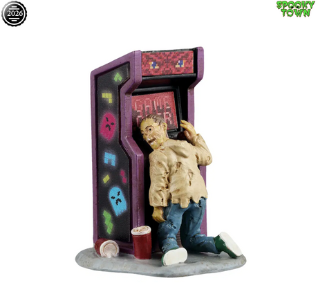 Lemax Spooky Town Game Over figurine featuring a vintage arcade game machine with spooky-themed details and eerie lighting.