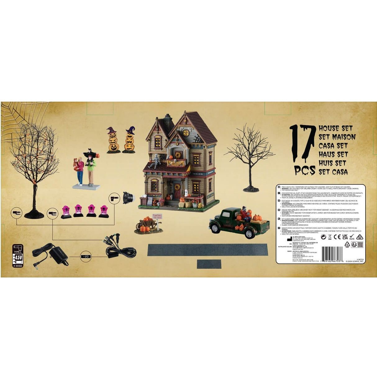 Lemax Spooky Town Halloween At The Wilsons illuminated buildings set featuring spooky house and Halloween decorations.