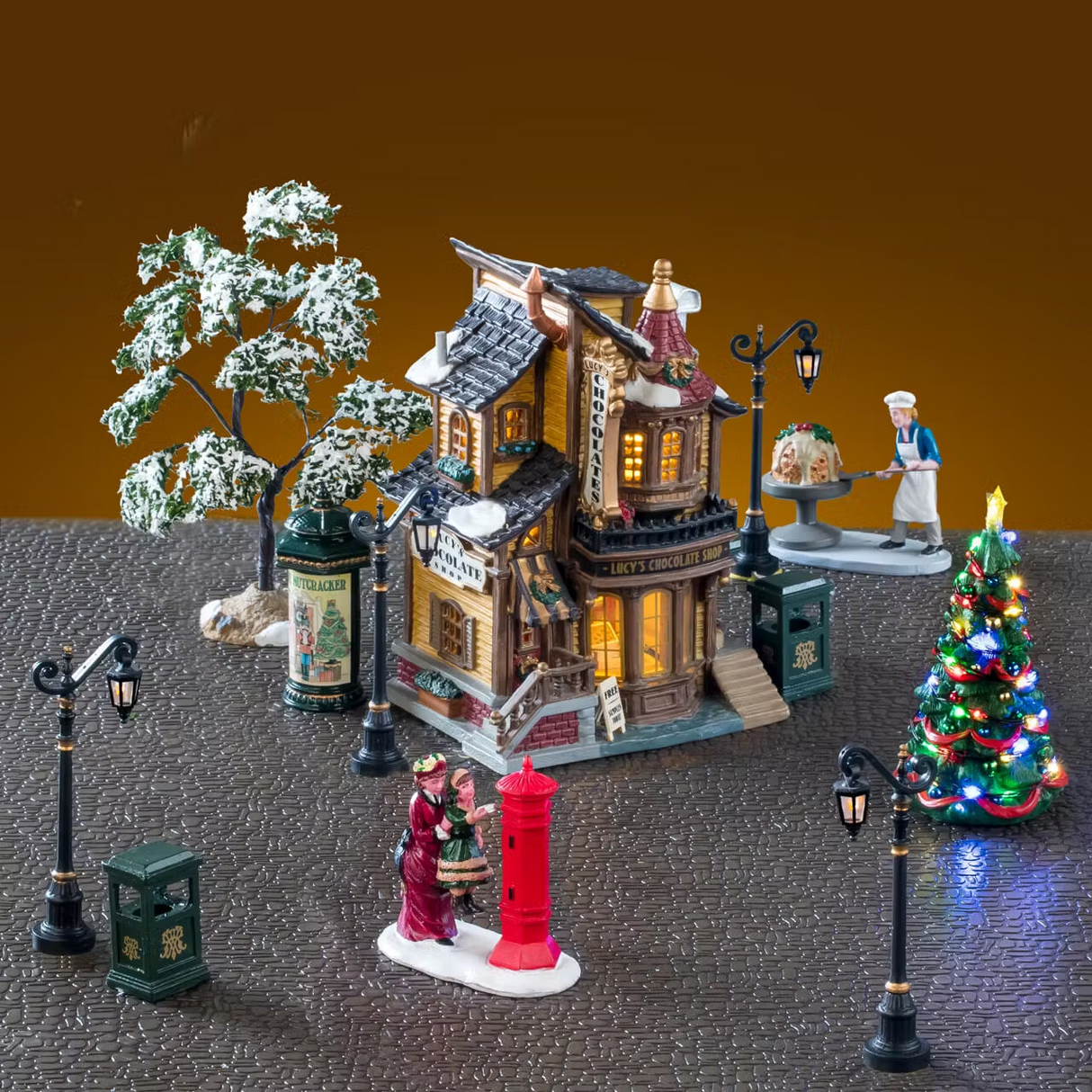 Lemax Lucy's Chocolate Shop Set with white Christmas village house and adapter, part of Lemax holiday village collection.
