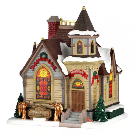 Lemax Maple Lane Chapel illuminated Christmas village building with detailed architecture and festive lighting display.