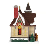 Lemax Maple Lane Chapel illuminated building from Christmas village display with festive winter scene and detailed architecture