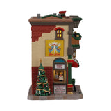 Lemax Mario's Pizzeria & Bistro illuminated building from Christmas village display, featuring detailed pizzeria and bistro design.