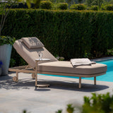 4 Seasons Outdoor Milano sunbed in Latte with cushion and headrest, metal garden furniture for outdoor lounging.