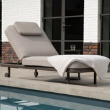 4 Seasons Outdoor Milano Terre sunbed in latte with cushion and headrest, metal outdoor furniture for relaxing in the sun.