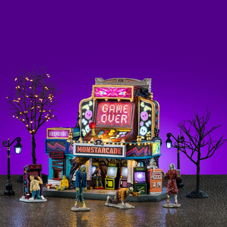 Lemax Spooky Town Monstarcade Set of illuminated Halloween-themed buildings with spooky details and colorful lights.