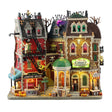 Lemax Spooky Town illuminated building featuring monsters on Main Street with spooky decorations, powered by 4.5V batteries.