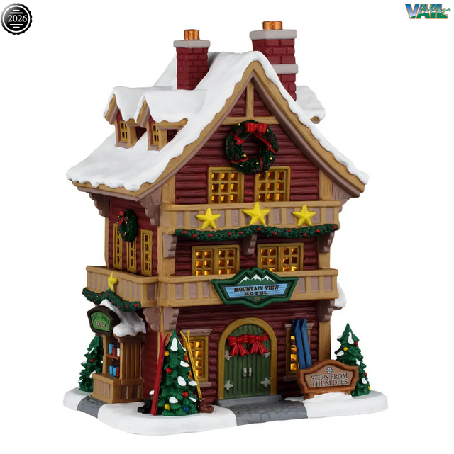 Lemax Mountain View Hotel illuminated building from Christmas village display, detailed miniature hotel with festive lighting.