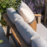 4 Seasons Outdoor Olivia lounge set with metal frame, includes Vic coffee table and footstool, outdoor furniture for relaxing.