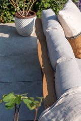 4 Seasons Outdoor Olivia modular lounge set with metal frame and Monroe coffee tables, featuring plush cushions and modern design.