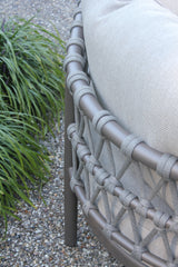 Close-up of the 4 Seasons Outdoor Piacenza modular lounge in Terre finish with Monroe coffee tables, featuring metal frame and stylish cushions.