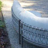 Close-up of the 4 Seasons Outdoor Piacenza modular lounge with Terre Monroe coffee tables, showcasing metal furniture details.