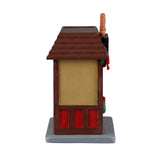 Lemax Christmas Village table accent featuring miniature pretzels with holiday-themed decorations and festive details.