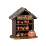 Lemax Spooky Town Pumpkin Shop table accent with carved pumpkin decorations and spooky Halloween details.