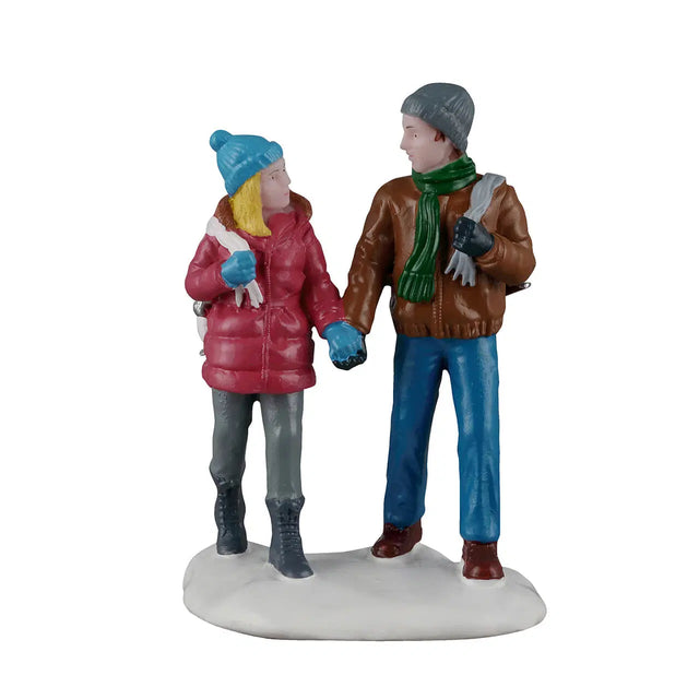 Lemax Skating Date Christmas Village figurine featuring a couple ice skating in festive holiday scene