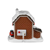 Lemax Ski Patrol Summit Station Christmas Village table accent featuring a snowy mountain rescue scene with skiers and rescue equipment.