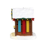 Lemax Christmas Village ski rental table accent featuring a snowy scene with skis, a small building, and festive holiday details.
