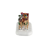 Lemax Christmas Village sled of toys table accent featuring a festive winter scene with miniature toys and snow details