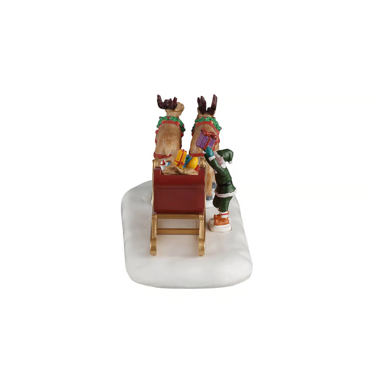 Lemax Christmas Village sled of toys table accent with miniature toys and winter scene, decorative holiday collectible.