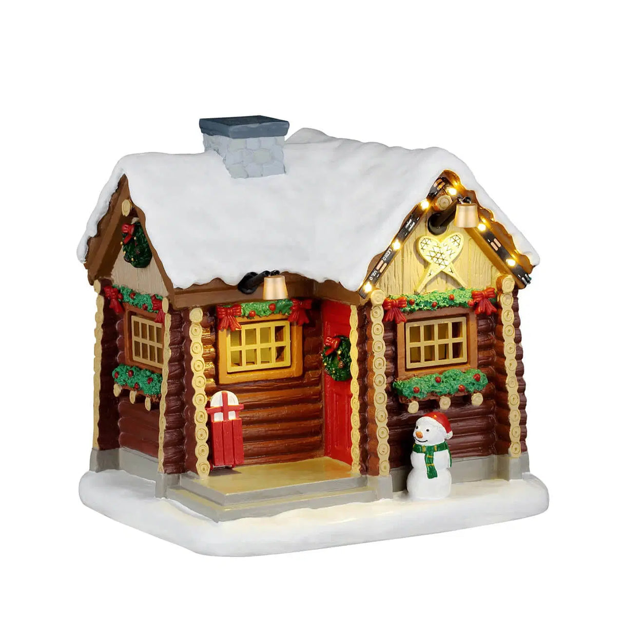 Lemax Snowshoe Cabin Christmas Village table accent featuring a cozy snow-covered cabin with snowshoes in front.