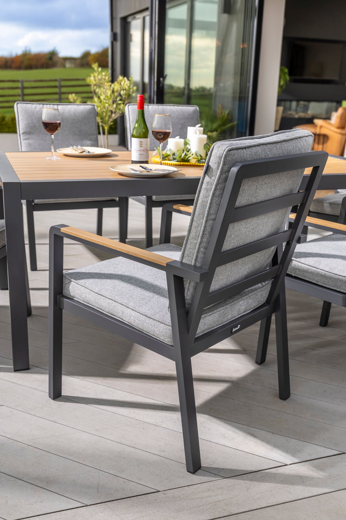 Hartman Sonas 6-seat rectangular aluminium garden dining set with matching chairs and table, ideal for outdoor patio use.