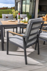 Hartman Sonas 6-seat rectangular aluminium garden dining set with matching chairs and table, ideal for outdoor patio use.