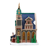 Lemax illuminated St. Stanislaus Cathedral building from the Christmas village collection, detailed with festive holiday lights.