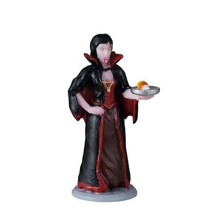 Lemax Spooky Town The Count's Candy figurine with a vampire character holding a basket of candy for Halloween display.