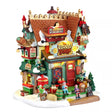 Lemax Eggnog Lounge illuminated building from Christmas village display, featuring festive holiday decor and detailed architecture