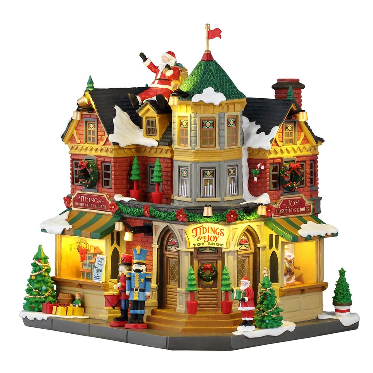 Lemax Tidings and Joy illuminated Christmas village building with festive holiday details and lights.