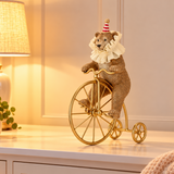 TimStor Christmas Circus Bear on Bicycle Polyresin Decoration (25.5 cm) – Vintage Bear on Gold Penny-Farthing Bicycle in Party Hat & Ruffled Collar