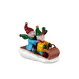 Lemax Christmas Village figurine of children tobogganing down a snowy hill, detailed holiday scene collectible.