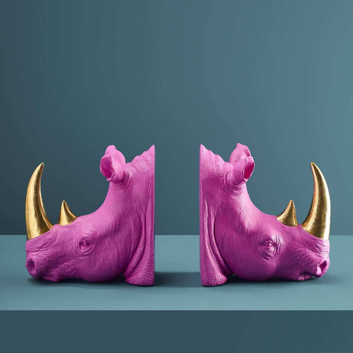 Werner Vob WERNS Rhinoceros bookends in magenta and gold, set of 2, decorative indoor ornaments for home.