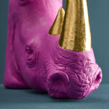 Set of two WERNS® Rhinoceros bookends in magenta and gold by Werner Vob, decorative indoor ornaments for shelves or desks.