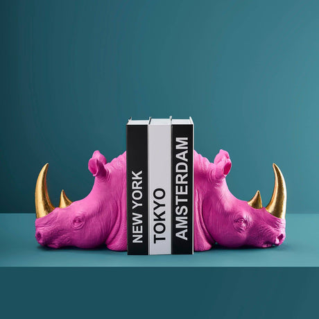 Set of two WERNS® Rhinoceros bookends in magenta and gold, decorative indoor ornaments for home shelving.