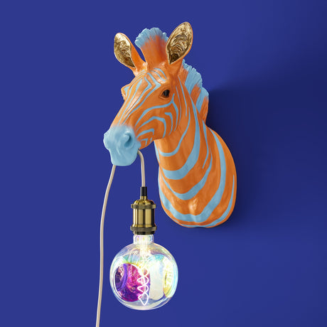 Blue and orange zebra-themed wall lamp by Werner Vob, featuring bold luxury designer statement lighting for indoor spaces.