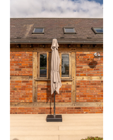 Kettler rectangular balcony parasol with auto tilt and night cover, wall-mounted outdoor furniture shade with wind-up feature.