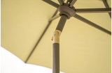 Kettler 2.5m wind-up stone canopy parasol with auto tilt and night cover, providing shade and style for outdoor furniture.